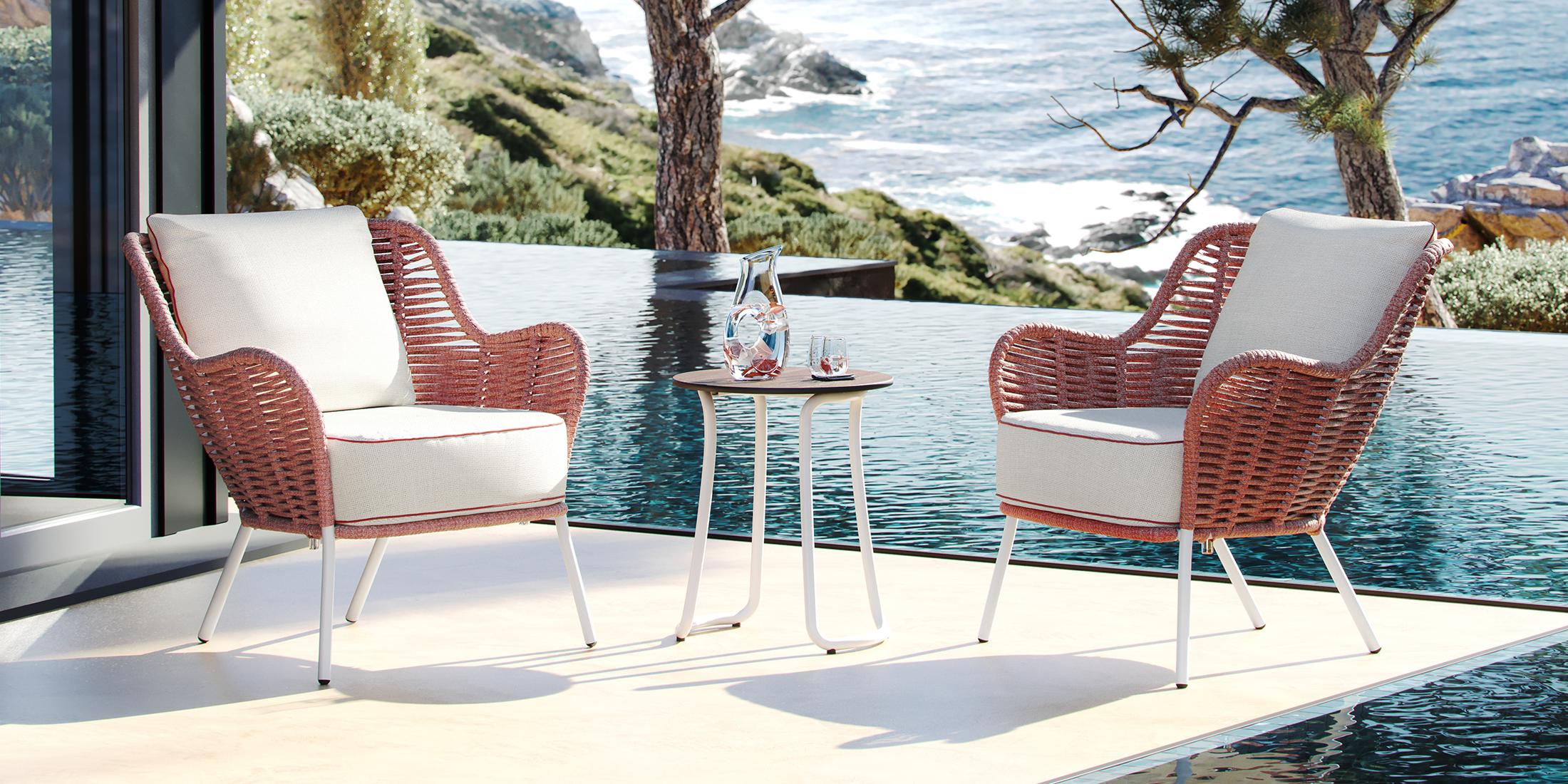 Malti Strap lounge seating grouped around a low outdoor table