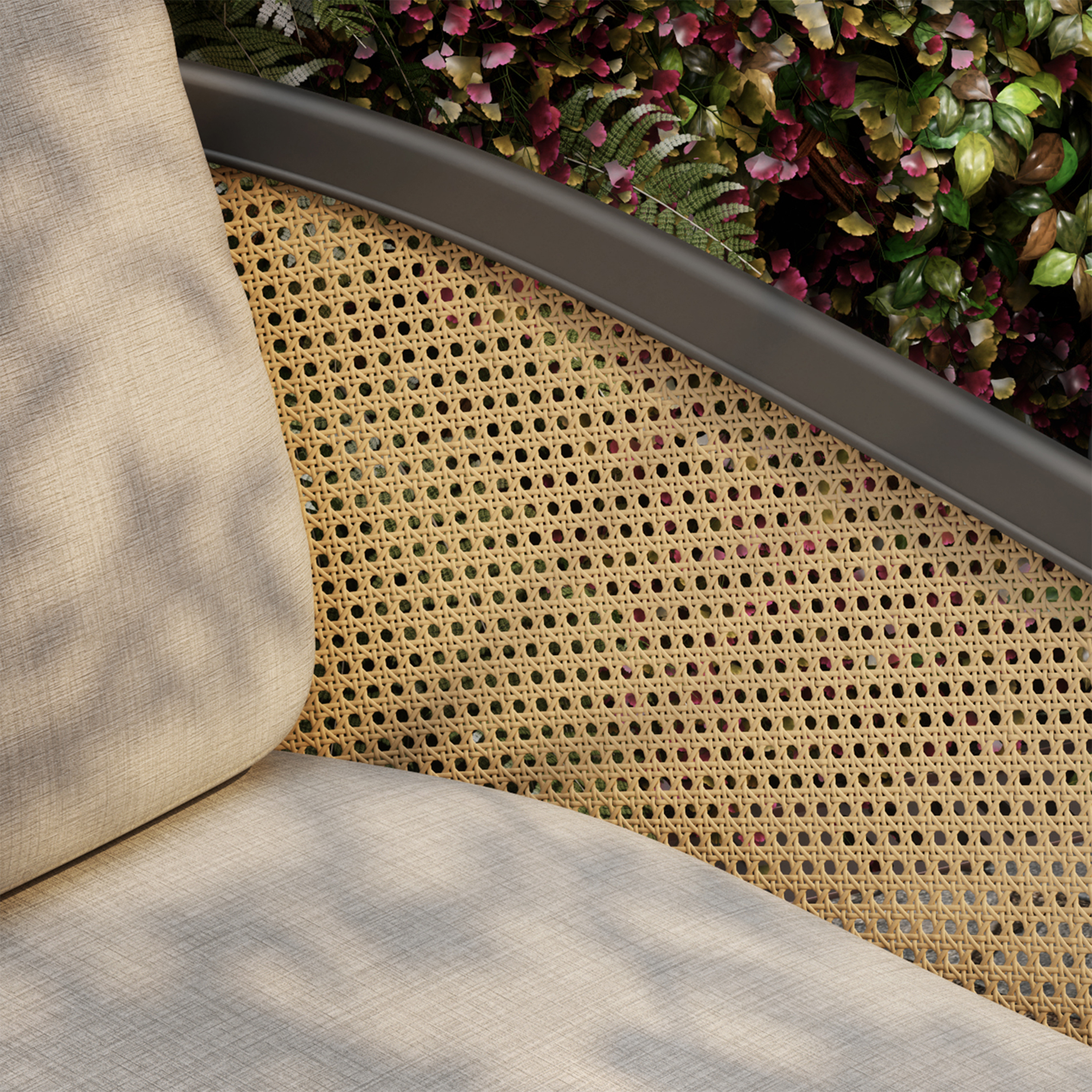 Close view of a Mende club chair with its seat and back cushions in place on the woven frame